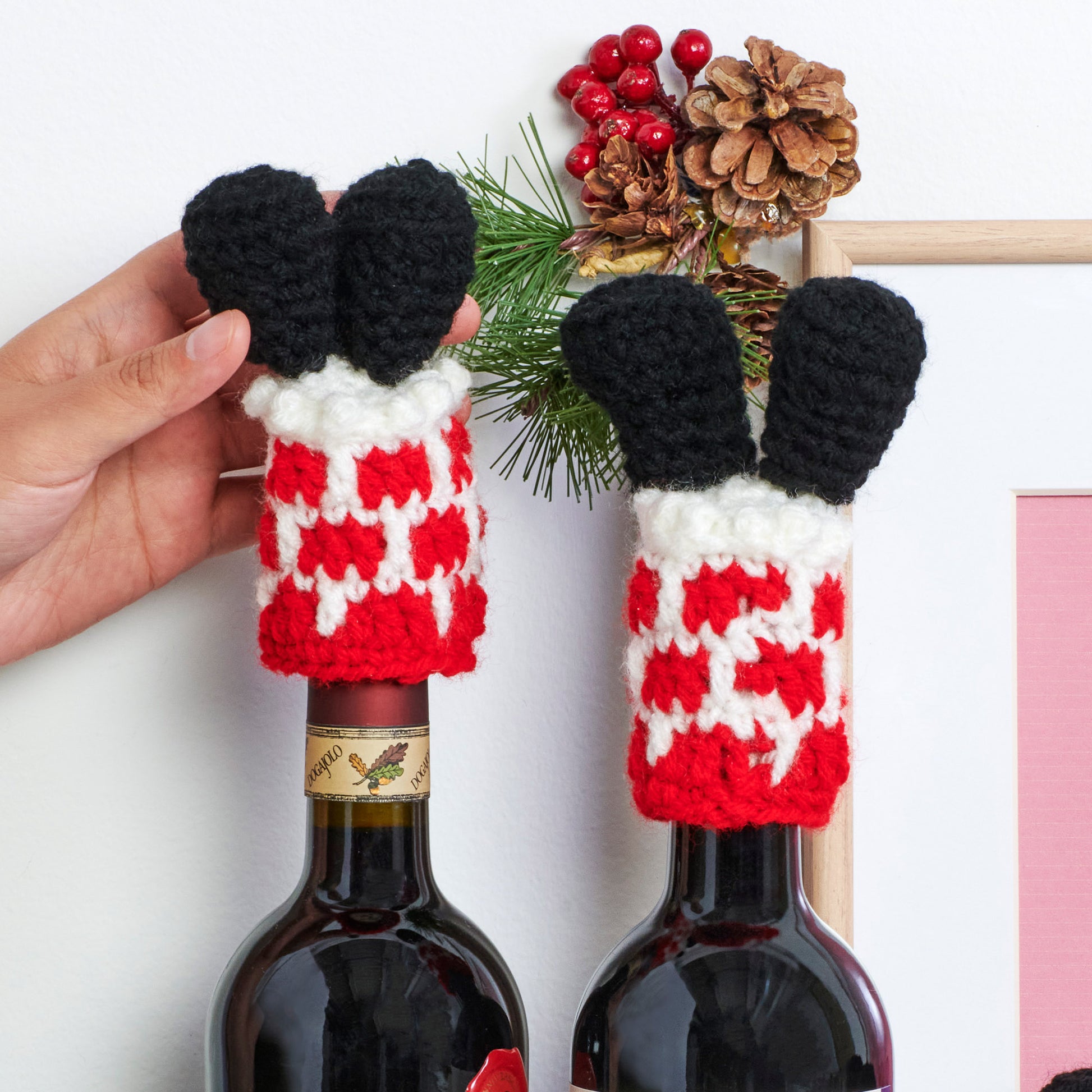 Free Red Heart Santa's Stuck! Crochet Bottle Toppers Pattern